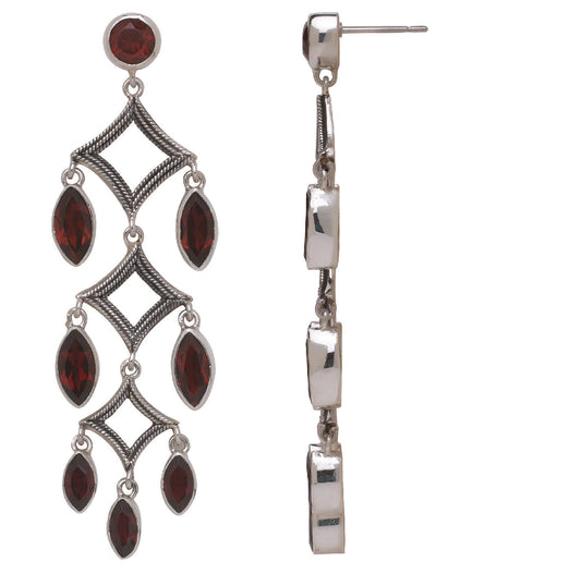Sterling silver chandelier earrings with faceted garnet stones in a triple diamond design from the Sasha 2003 Archive.