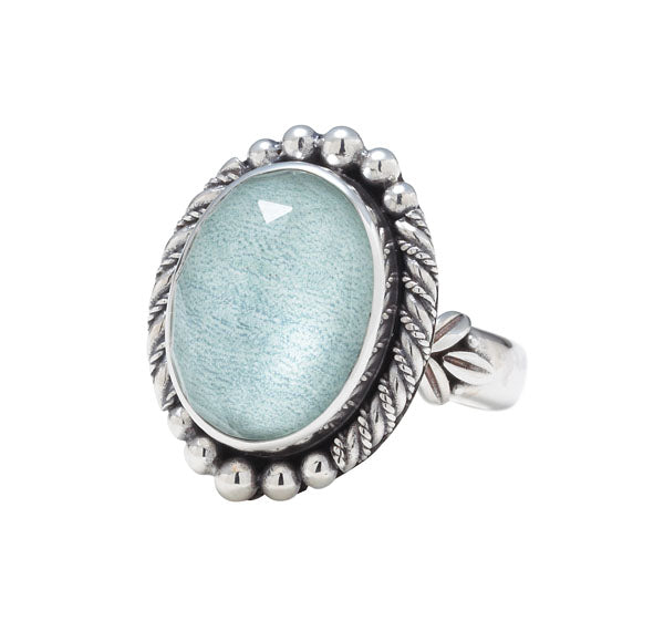 Sterling oval ring with cabochon aspen wood quartz and rope bezel (Wisteria 2008).
