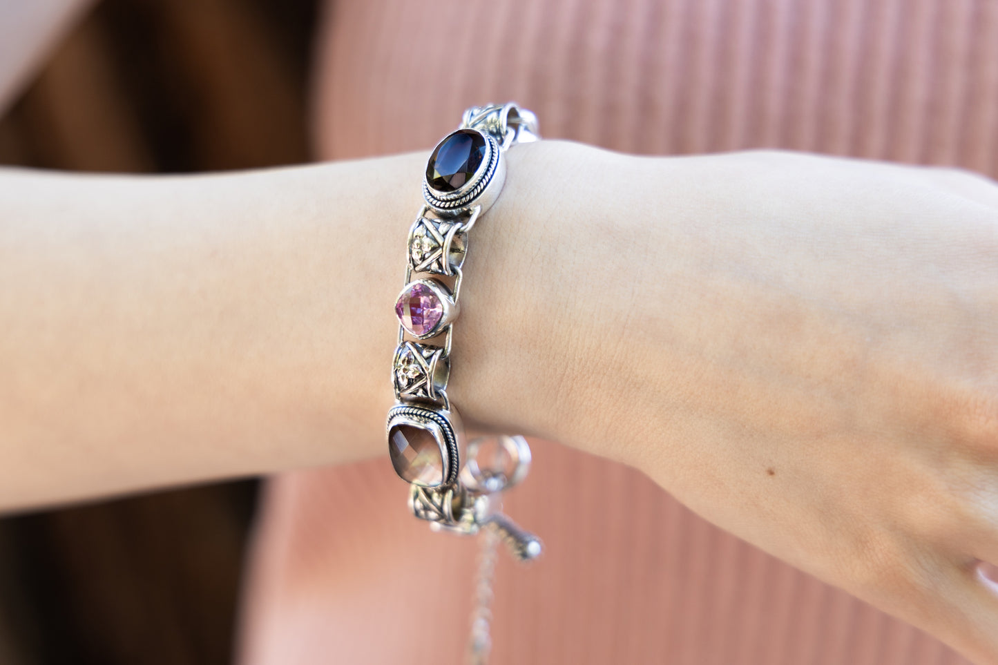 Sterling silver link bracelet with mocha pearl, smoky quartz, and pink sapphire cushion stones