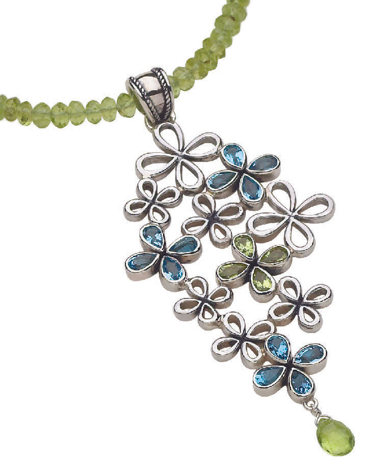 Sterling silver clover cluster pendant with topaz and peridot on faceted bead strand