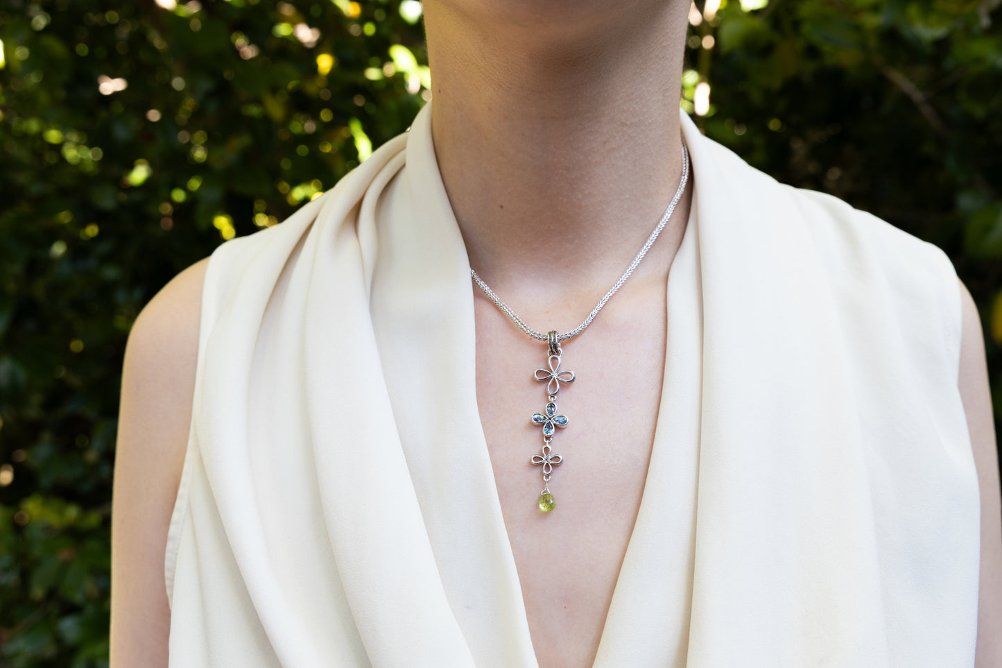 Vertical clover drop necklace with blue topaz and peridot on foxtail chain