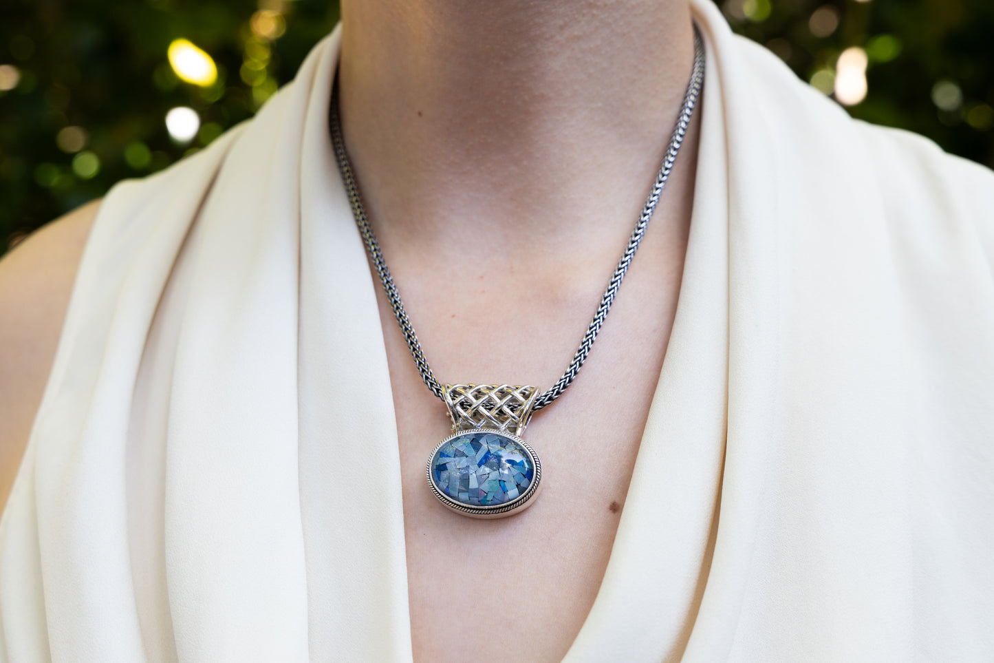 Sterling silver snake chain necklace with oval mosaic opal pendant