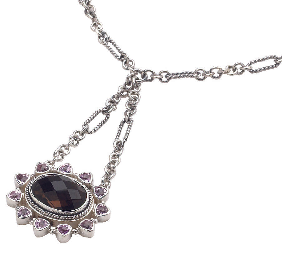 Sterling silver floral drop necklace with smoky quartz and pink sapphires on figaro chain.