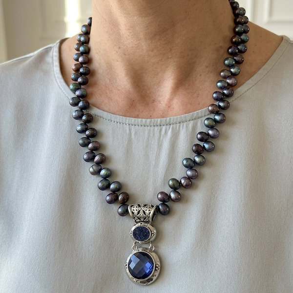 Sterling silver pendant with blue drusy and created blue sapphire on peacock pearl strand, Windsor Collection 2009, Lori Bonn Archive.