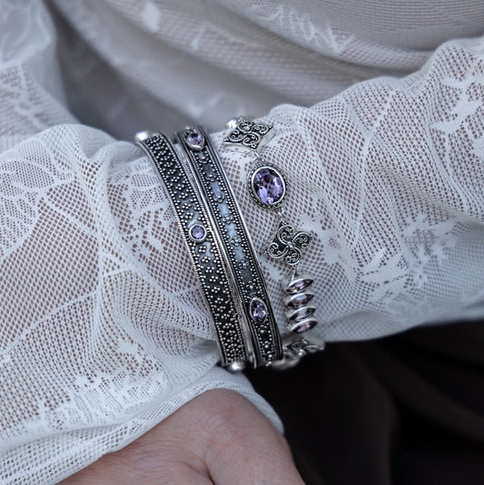 Sterling silver bracelets with amethyst stones and granulation detailing, Heirloom Collection 2002, Lori Bonn Archive.