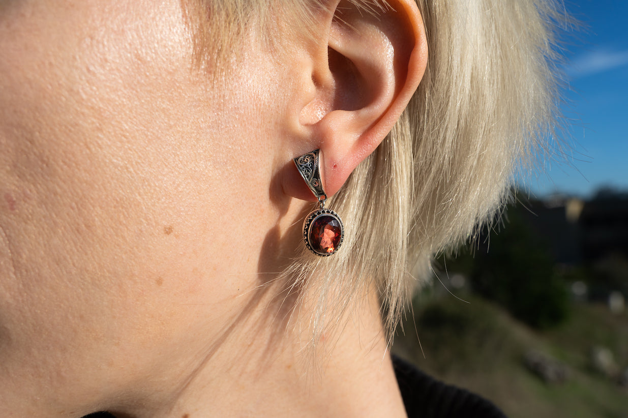 Drop earrings with faceted gypsy red topaz and tapered silver box top with granulation