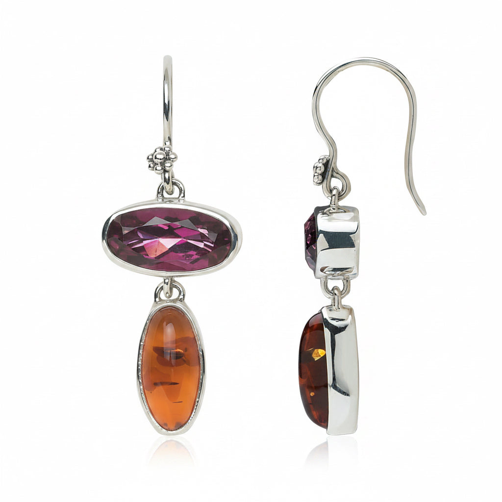 Sterling silver drop earrings with faceted oval raspberry topaz and Baltic amber cabochon in bezels on French wire, Parisian Muse Collection 2004, Lori Bonn Archive.