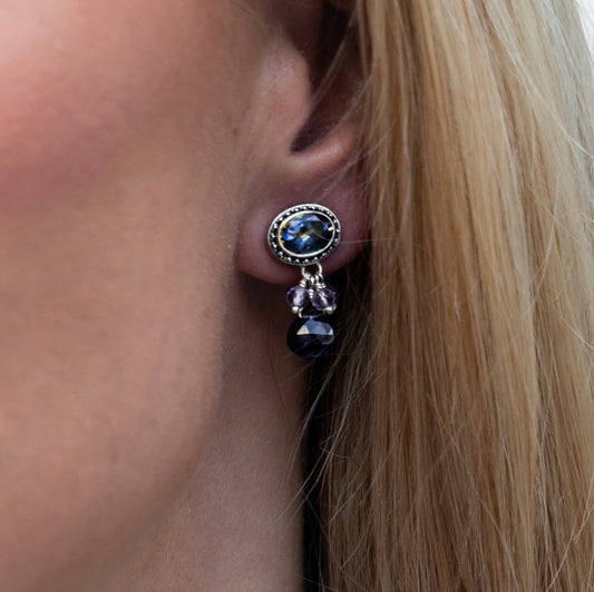 terling silver post earrings with oval mystic fire topaz top, amethyst rondelle cluster, and amethyst briolette drop on model from the Lori Bonn Parisian Muse 2004 Archive collection.