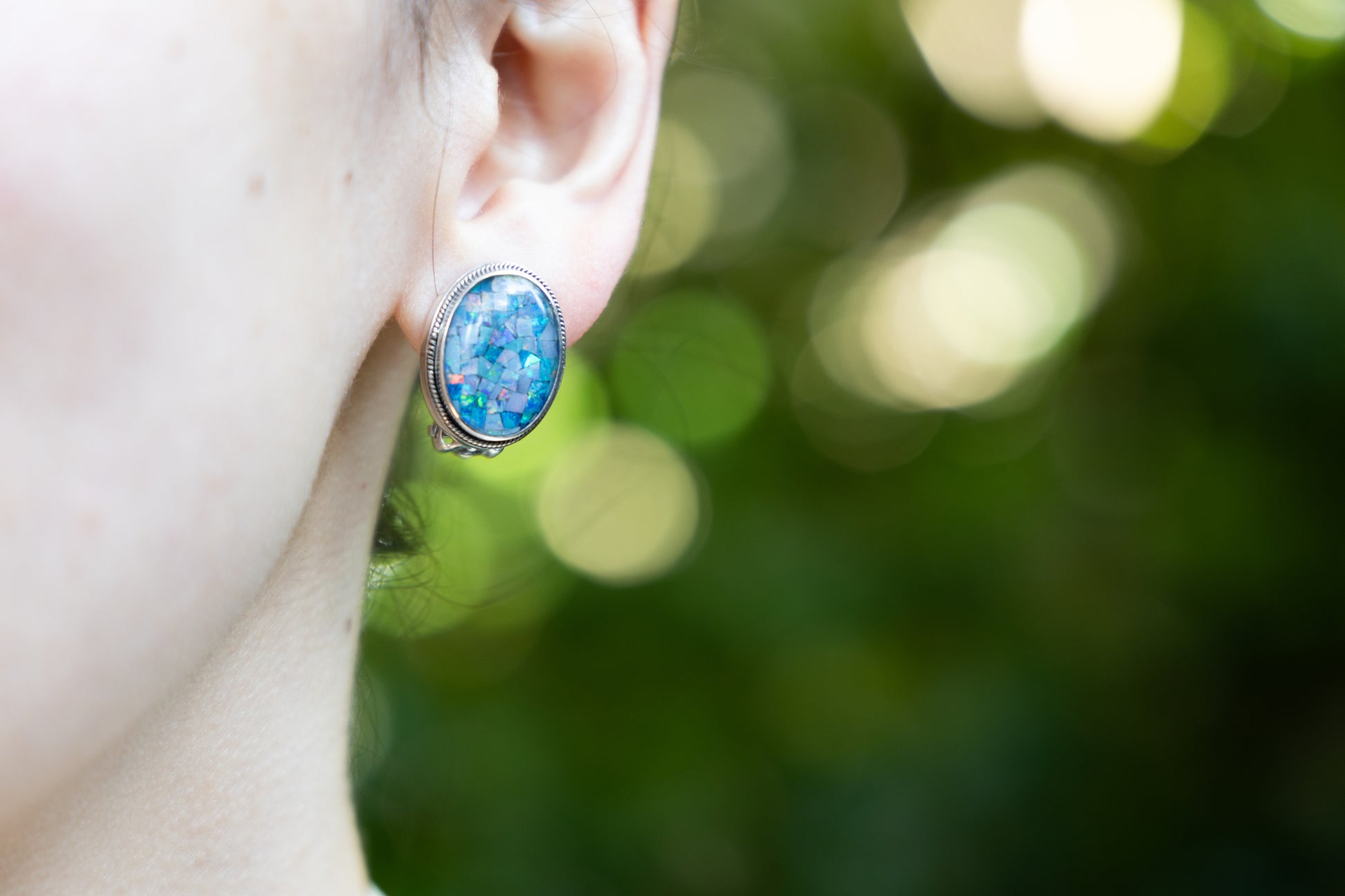Sterling silver oval clip earrings with domed mosaic opal