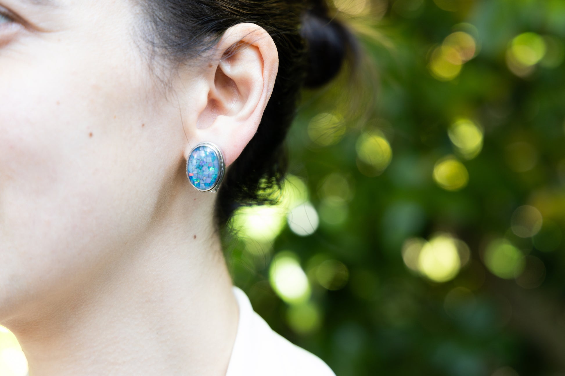Sterling silver oval clip earrings with domed mosaic opal