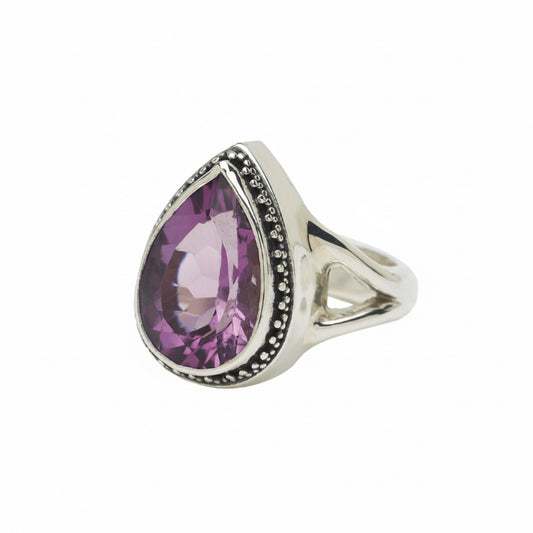 Sterling silver pear cocktail ring with faceted amethyst in granulated bezel and split shank, Parisian Muse Collection 2004, Lori Bonn Archive.