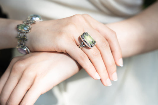 Sterling cushion rectangle ring with faceted prehnite and beaded border (Wisteria 2008).