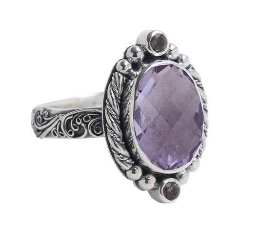 Oval faceted amethyst ring with granulated sterling halo, smoky-quartz accents, and scroll-filigree shank – Chrysalis 2008 archive