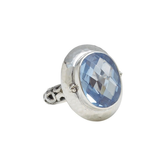 Sterling silver cocktail ring with large oval blue spinel and open circle detail around a hand-hammered setting, Lori Bonn Splash Collection 2009 Archive.