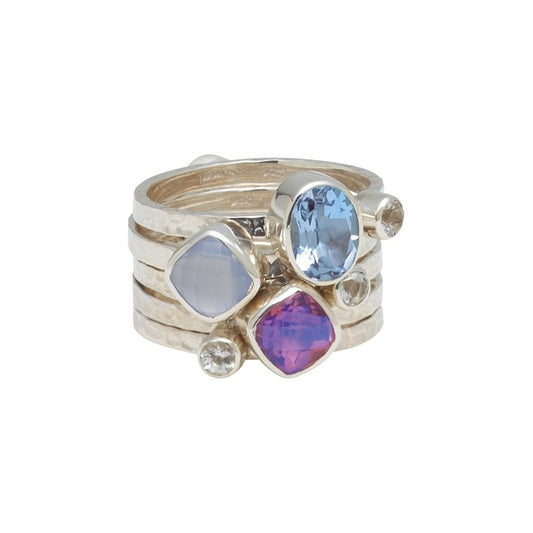 Set of five sterling silver stacking rings with hammered shanks and chalcedony, blue spinel, white quartz, and rainbow lavender quartz, size 8, Lori Bonn Splash Collection 2009 Archive.