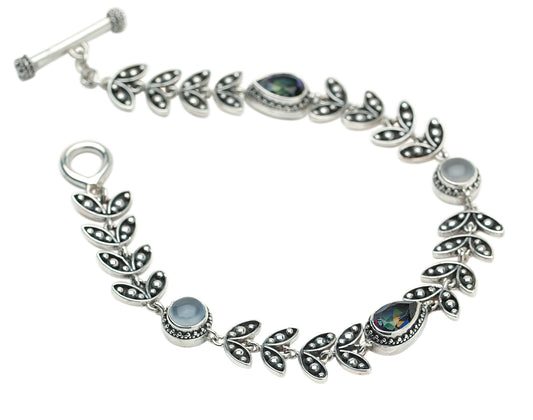 Sterling silver leaf vine link bracelet with pear-shaped mystic fire topaz and round chalcedony cabochons, toggle clasp, Heirloom Collection 2002, Lori Bonn Archive.