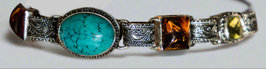 Sterling silver link bracelet with turquoise, amber, and Oro Verde quartz, handcrafted in Bali