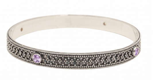 Sterling silver bangle bracelet with round amethyst stones and granulation detailing, Heirloom Collection 2002, Lori Bonn Archive.