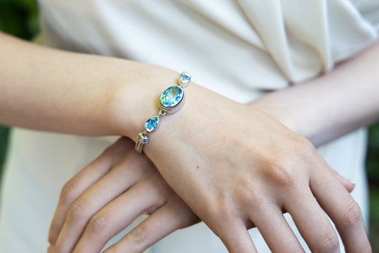 Foxtail-linked sterling silver bracelet with oval and pear Swiss blue topaz