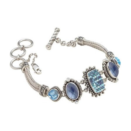 Sterling silver snake chain bracelet with blue spinel, alexandrite, white quartz, and metallic shell mosaic in hand-worked bezels, toggle clasp with safety chain, Lori Bonn Cielo Collection 2008 Archive.