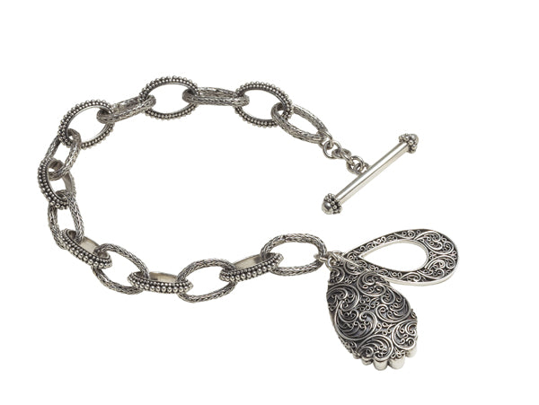 Sterling-silver charm bracelet with faceted smoky-quartz teardrop and toggle clasp, Chrysalis 2008 archive sample