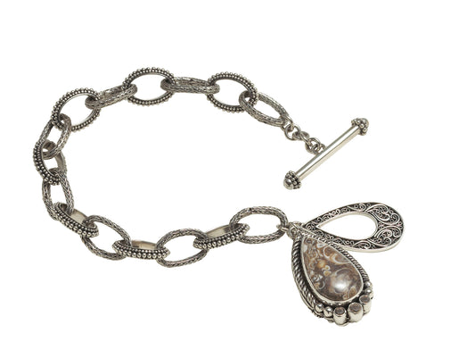 Sterling-silver toggle bracelet with teardrop Turtella fossil charm, Lori Bonn Chrysalis 2008