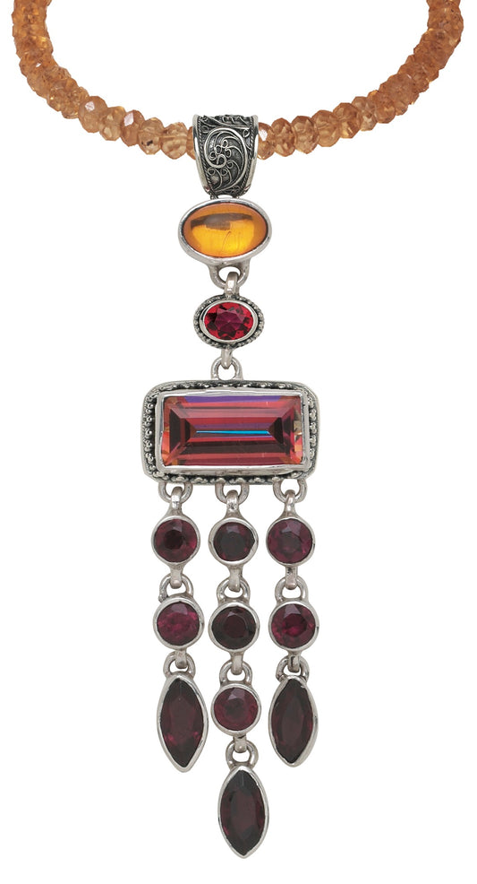 Sterling silver chandelier enhancer pendant with amber, garnet, and deep twilight topaz on an adjustable 16–18 inch faceted hessonite bead necklace from the Sasha 2003 Archive.
