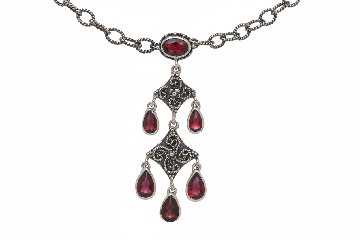 Sterling silver chandelier necklace with faceted garnet drops and hand-fabricated filigree from the Sasha 2003 Archive.