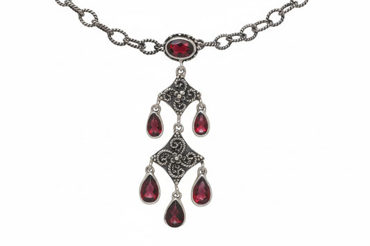 Sterling silver chandelier necklace with faceted garnet drops and hand-fabricated filigree from the Sasha 2003 Archive.