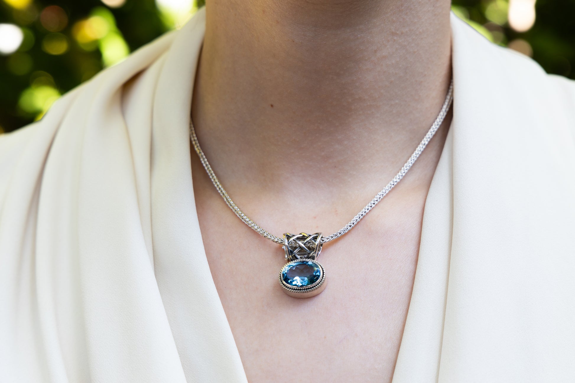 Sterling silver foxtail necklace with oval Swiss blue topaz pendant