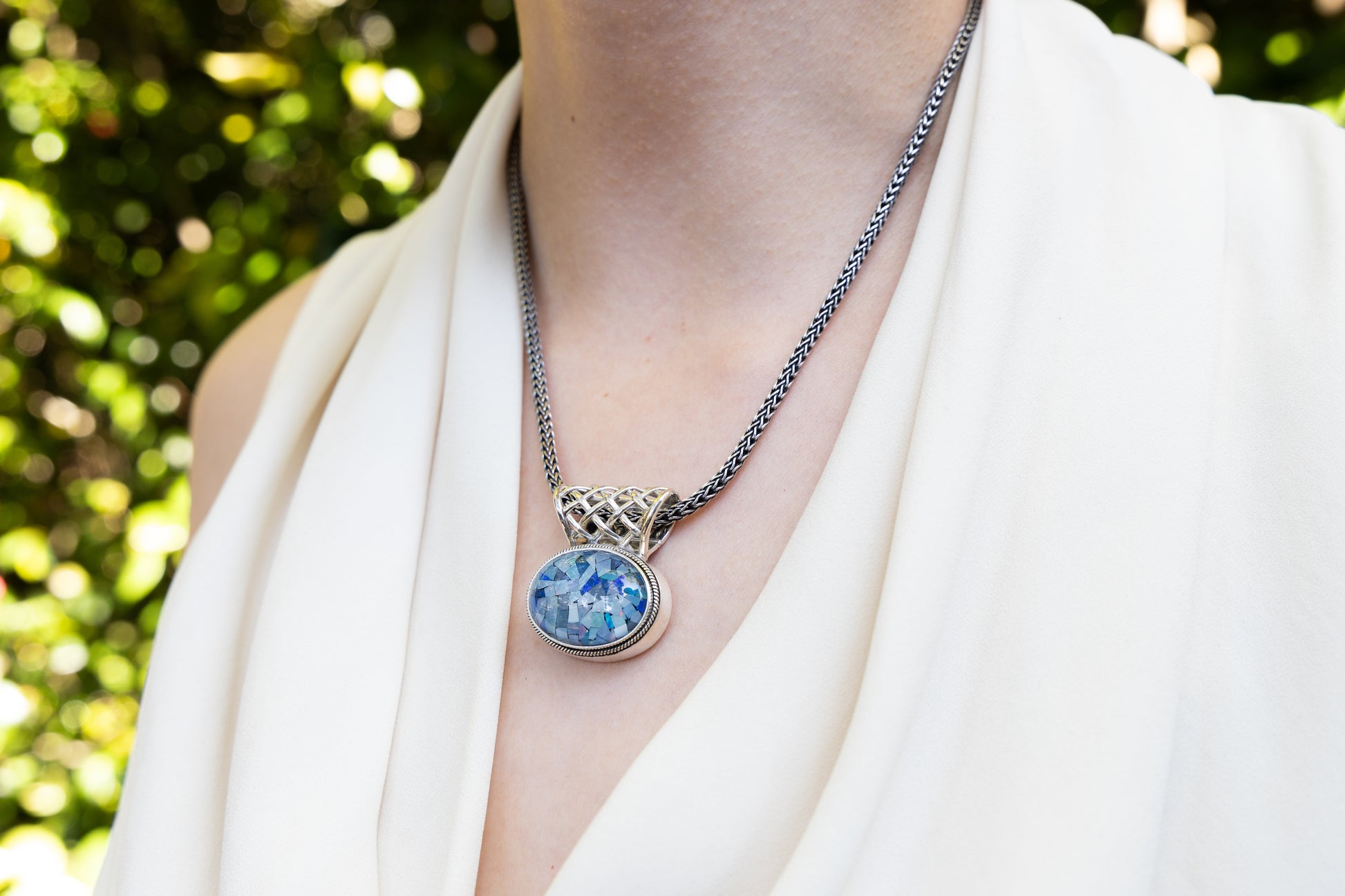 Sterling silver snake chain necklace with oval mosaic opal pendant