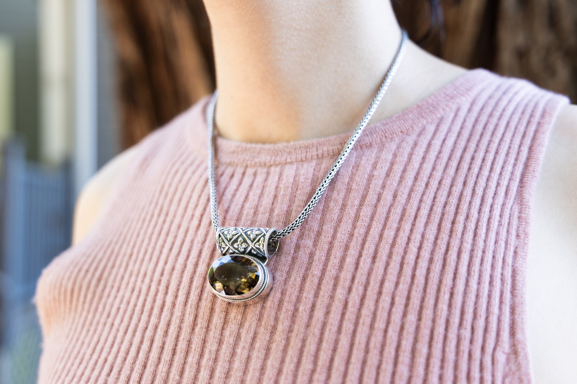 Sterling silver oval smoky quartz pendant on handwoven snake chain with enhancer bale.