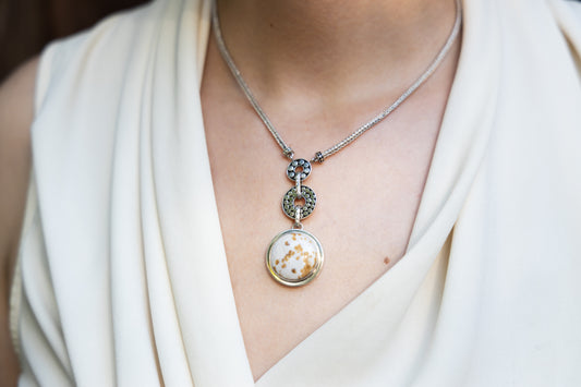 Sterling-silver foxtail-chain necklace with double-dot links and round polka-dot chalcedony pendant, worn on model – Chrysalis 2008 archive