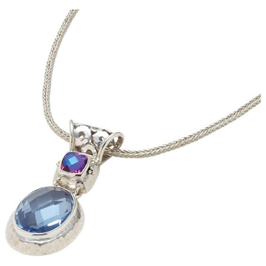 Sterling silver pendant with rainbow lavender quartz cushion and large oval blue spinel briolette under openwork swirl bail on handwoven foxtail chain, Lori Bonn Splash Collection 2009 Archive.