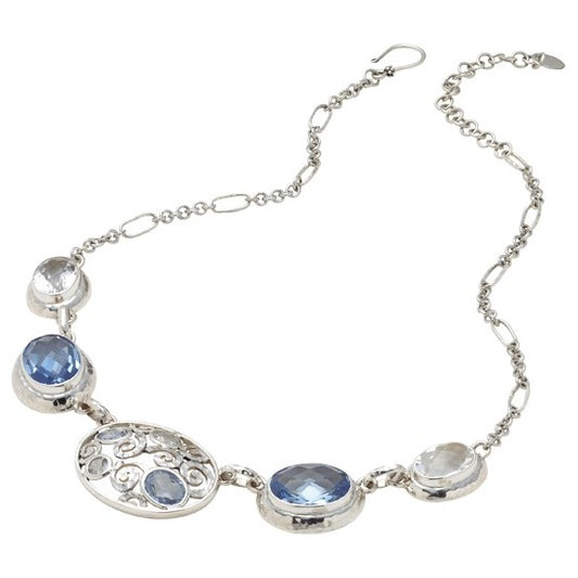 Sterling silver collar necklace with openwork swirl center oval and blue spinel and white quartz briolettes on hand-hammered figaro chain, Lori Bonn Splash Collection 2009 Archive.