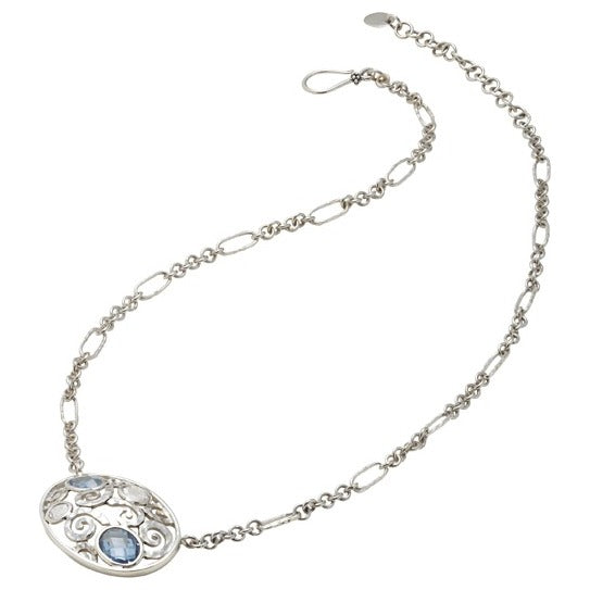 Sterling silver necklace with oval openwork swirl medallion set with blue spinel and white quartz on hand-hammered figaro chain, Lori Bonn Splash Collection 2009 Archive.