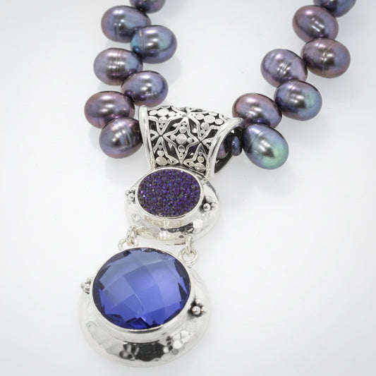 Sterling silver pendant with blue drusy and created blue sapphire on peacock pearl strand, Windsor Collection 2009, Lori Bonn Archive.