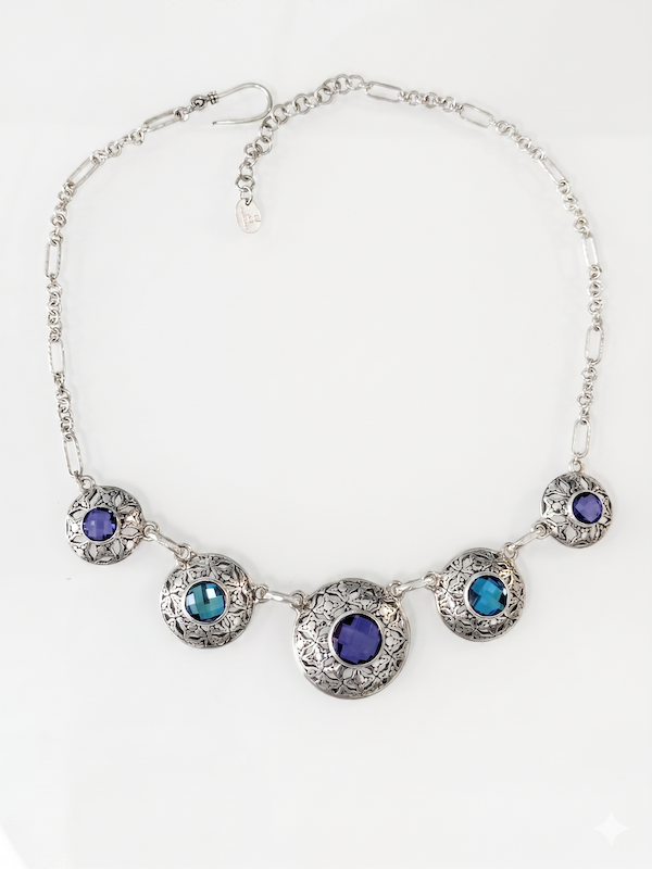 Sterling silver five medallion necklace with Windsor gate pattern, created blue sapphire and mystic quartz on handmade figaro chain, Windsor Collection 2009, Lori Bonn Archive.
