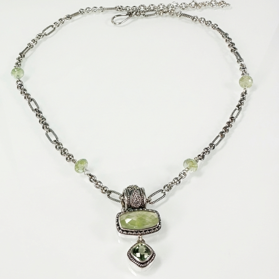 Sterling silver double-drop enhancer pendant with faceted prehnite and green spinel on an 18-inch figaro chain with prehnite bead accents.
