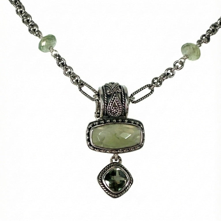 Sterling silver double-drop enhancer pendant with faceted prehnite and green spinel on an 18-inch figaro chain with prehnite bead accents.