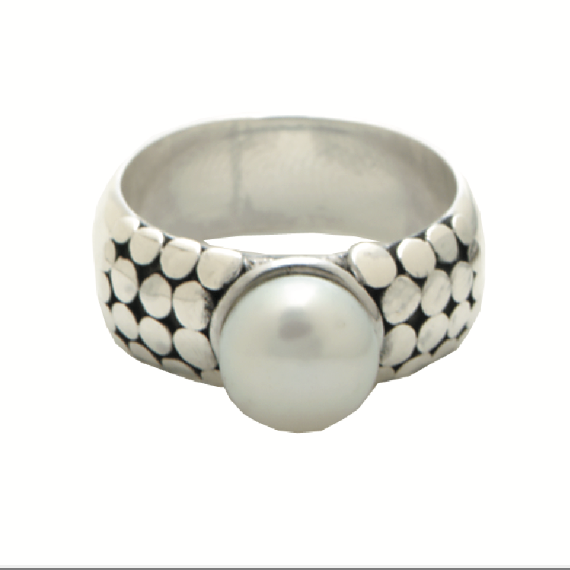Sterling silver pearl ring with circular granulation detailing from the Blush 2006 Collection.