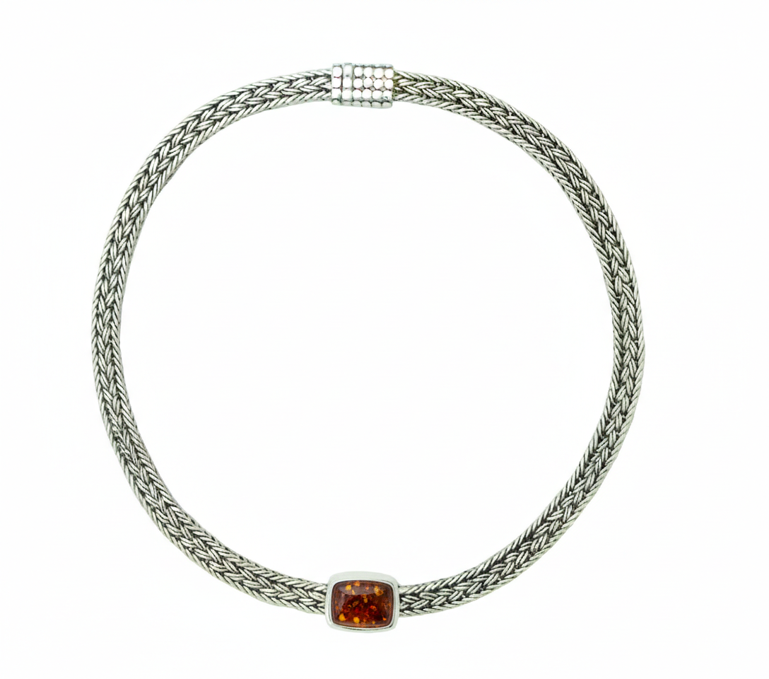 Handwoven sterling silver ikat necklace with rectangular Baltic amber centerpiece and hidden clasp, from the Lori Bonn Archive, Ikat Collection 1998.