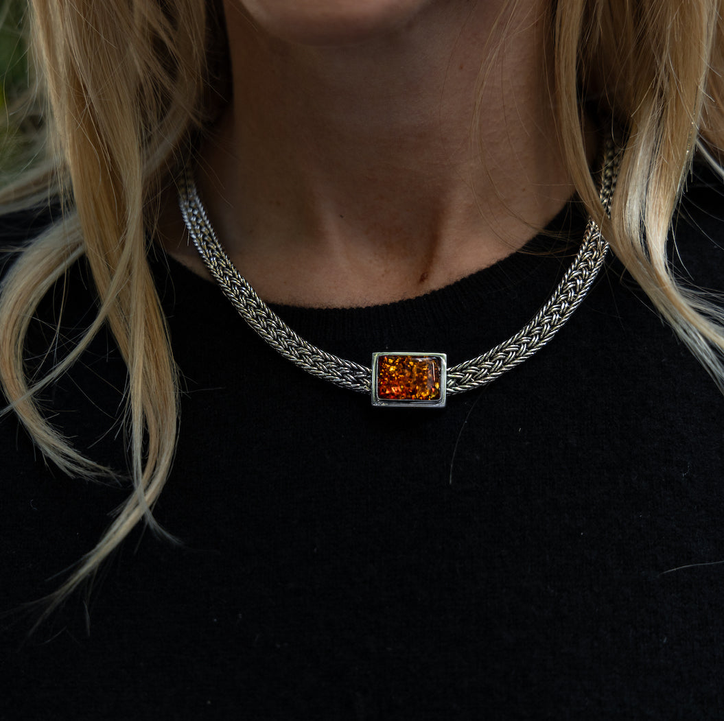 Handwoven sterling silver ikat necklace with rectangular Baltic amber centerpiece and hidden clasp, from the Lori Bonn Archive, Ikat Collection 1998.
