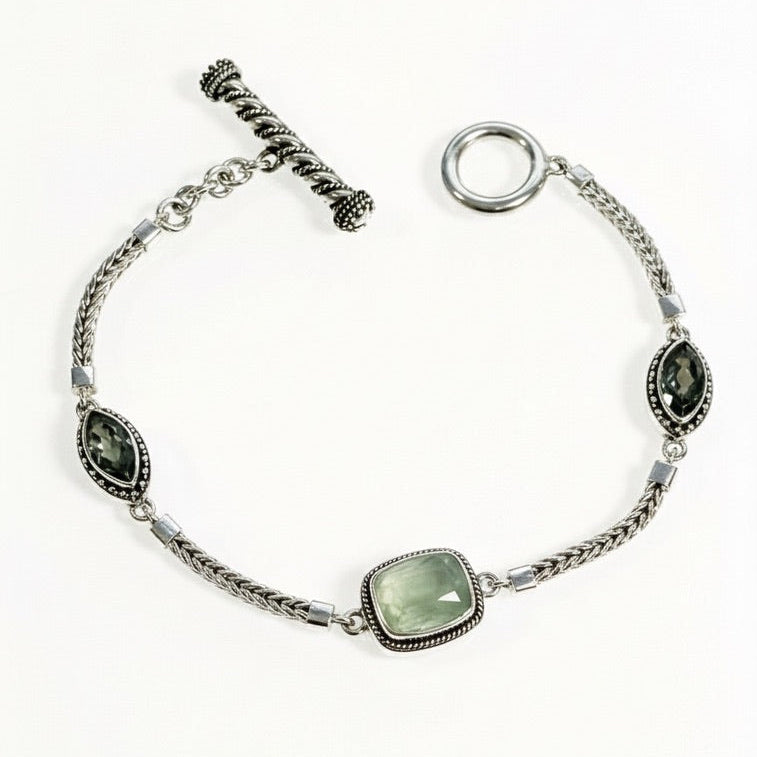 Sterling silver handwoven foxtail bracelet with cushion-cut prehnite and green spinel accents from the Verde 2006 Collection.