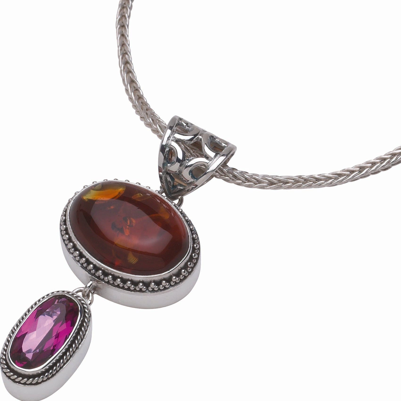 Sterling silver pendant necklace with Baltic amber cabochon in granulated bezel and faceted raspberry topaz drop, open scrollwork bail, on handwoven foxtail chain. One-of-a-kind sample, Parisian Muse Collection, 2004, Lori Bonn Archive.