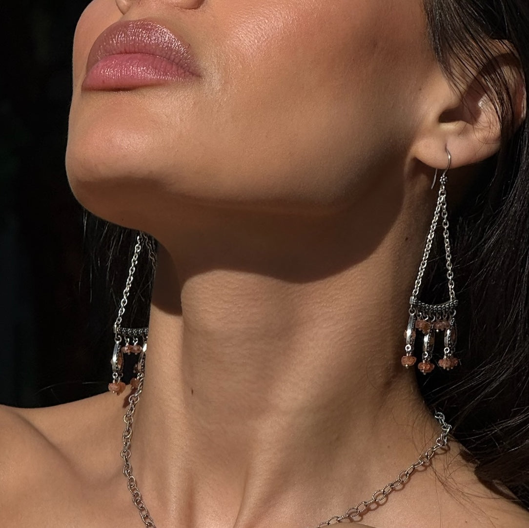  Sterling silver chandelier earrings with sunstone rondelle beads and granulated teardrop frames on chain, Parisian Muse Collection 2004, Lori Bonn Archive.
