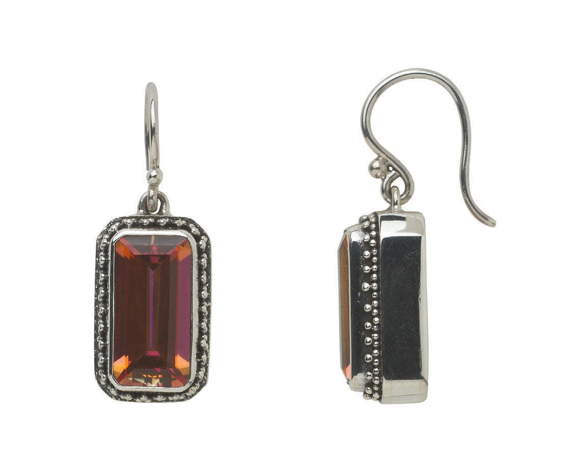 Sterling silver baguette drop earrings with faceted deep twilight topaz in granulated bezel on French wire, Sasha Collection 2003, Lori Bonn Archive.