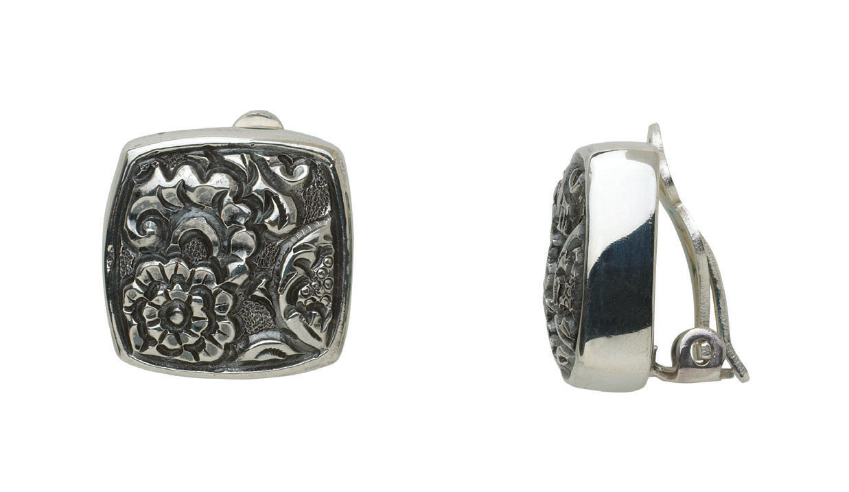 Sterling silver cushion square clip earrings with hand-carved floral repoussé, Sasha Collection 2003, Lori Bonn Archive.
