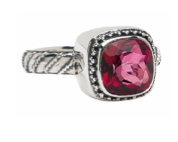 Cushion-cut gypsy red topaz ring with silver bezel and twisted wire shank