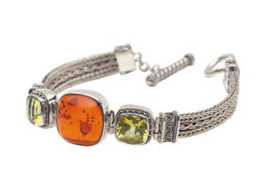 Multi-strand sterling silver bracelet with cushion-cut amber and Oro Verde quartz, handcrafted in Bali